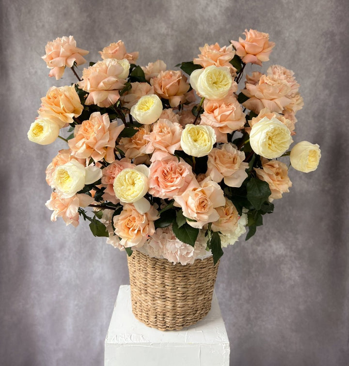 Flowers basket "First love" with roses and ranunculus