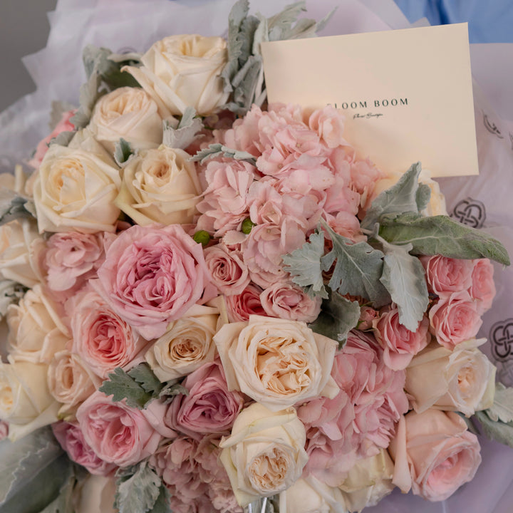 Bouquet "Sunset clouds" with roses and hydrangea