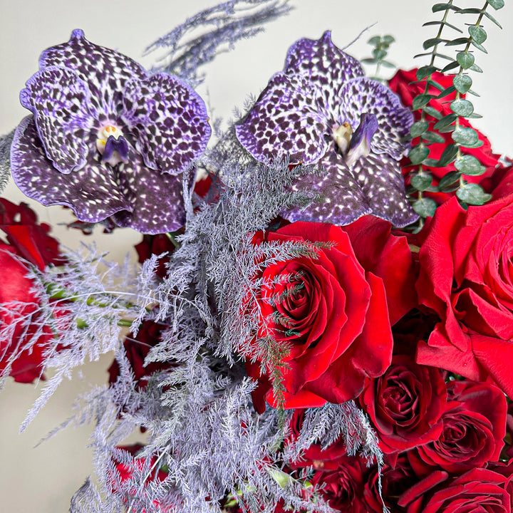 Flower box "Red Velvet" with roses and orchid