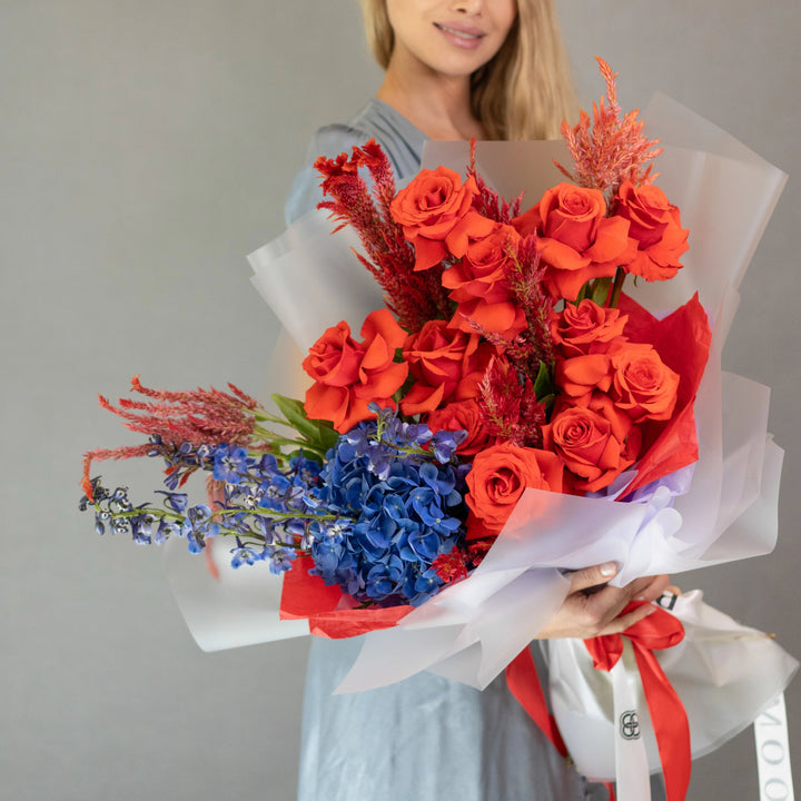 Bouquet "Moonlit Blooms" with red roses and blue hydrangea