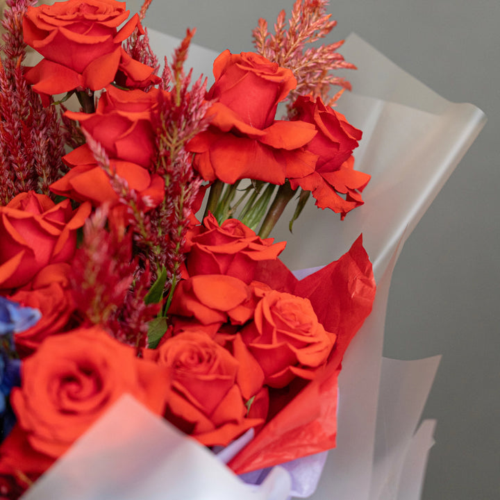 Bouquet "Moonlit Blooms" with red roses and blue hydrangea