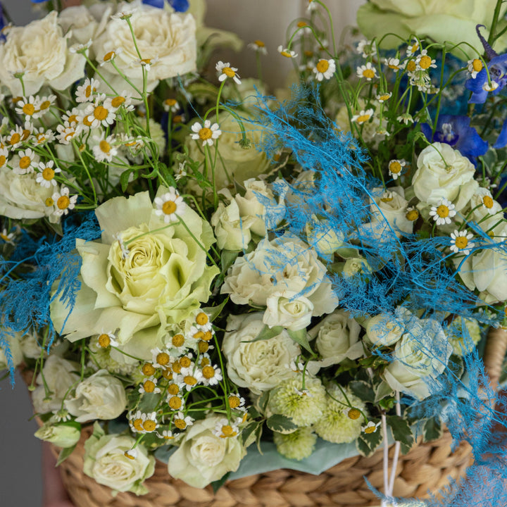 Flower basket "Blue Summer Vibe" with rose delphinium and chamomile