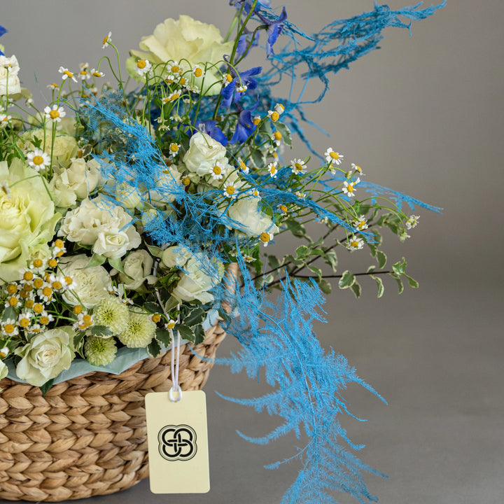 Flower basket "Blue Summer Vibe" with rose delphinium and chamomile