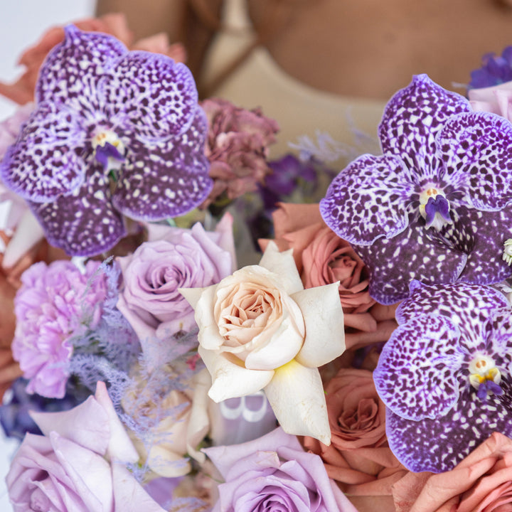 Box Lavender Raf with carnations and orchids