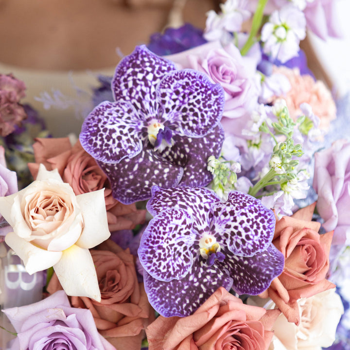 Box Lavender Raf with carnations and orchids