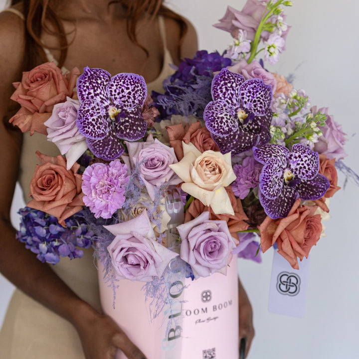 Box Lavender Raf with carnations and orchids