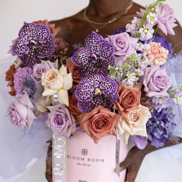 Box Lavender Raf with carnations and orchids