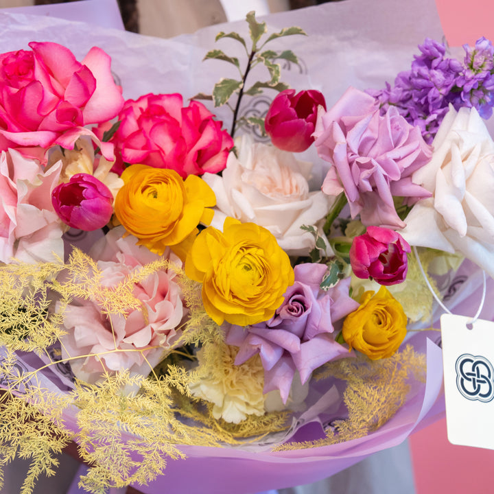 Small bouquet "Spring garden" with roses and tulips