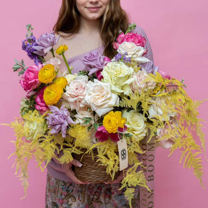 Flower basket "Spring Garden" with roses and tulips