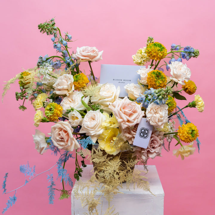 Flower basket "Lovely" with roses and tulips