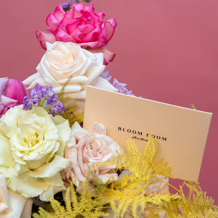 Flower basket "Spring Garden" with roses and tulips