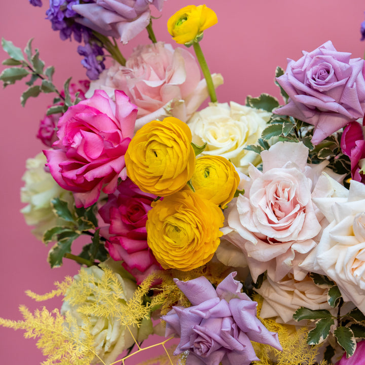 Flower basket "Spring Garden" with roses and tulips