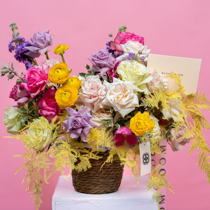 Flower basket "Spring Garden" with roses and tulips