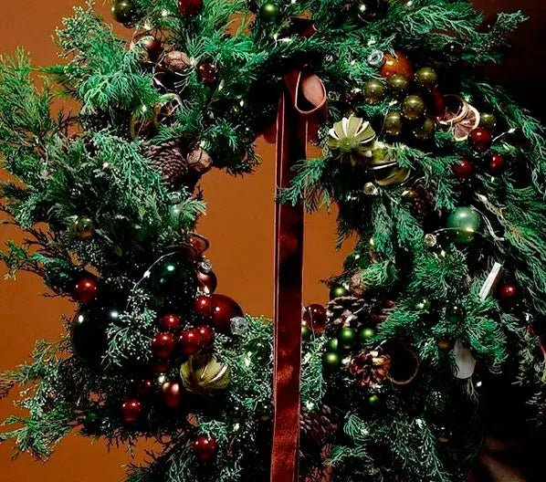 Handmade Christmas wreath with red velvet ribbon